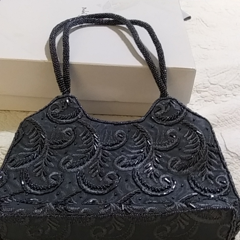 Women evening beaded sequin hand bag in slate blue. In great condition.